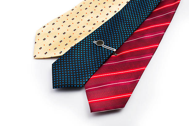 Man holding a necktie on white background close-up view