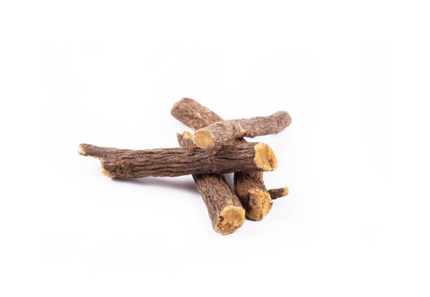 istock Liquorice root isolated on white background 1816867772