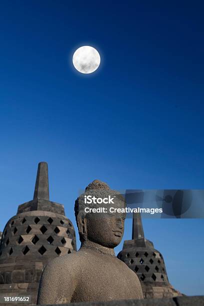 Statue And Stupa At Borobudur 1 Stock Photo - Download Image Now - Ancient, Archaeology, Architecture