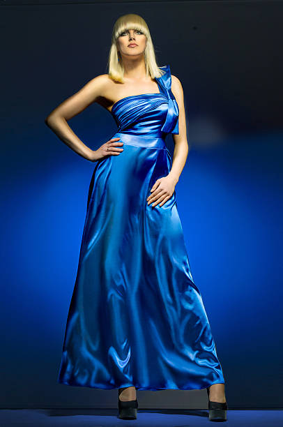 blue kleid - fashion model women cleavage human hair stock-fotos und bilder