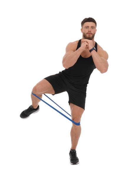 istock Young man exercising with elastic resistance band on white background 1816950242