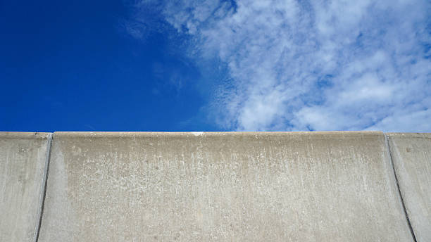 istock barrier fence on the highway with blue sky 181696450