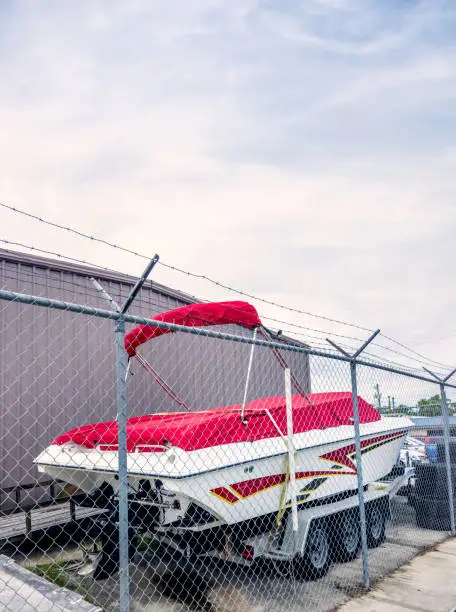 Photo of Covered boat in parking lot