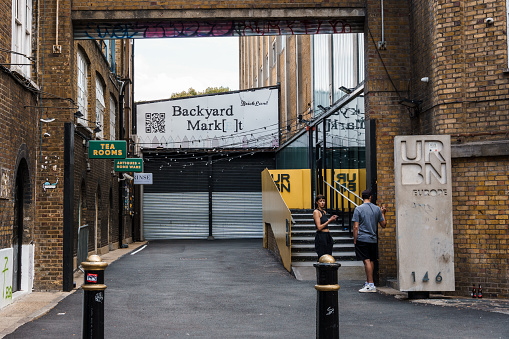 London, UK - August 25, 2023: Entrance to Backyard Market in Brick Lane in Shoreditch Area in the East End