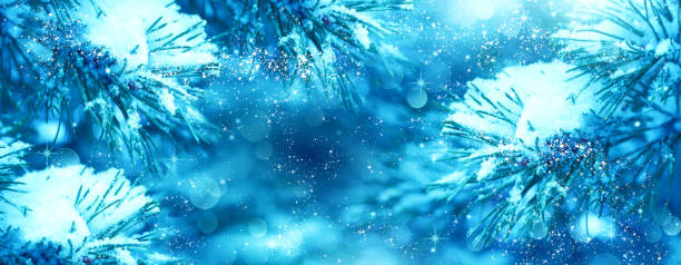 istock Christmas Tree. Christmas New Year Winter blurred background. Magic winter snow landscape. Christmas greeting card. Christmas lights. Space for text. 1816980393