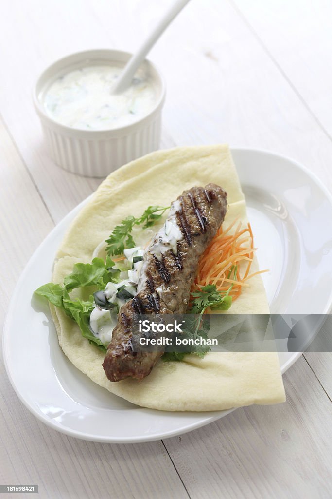 ground lamb kebab on flat bread Animal Stock Photo