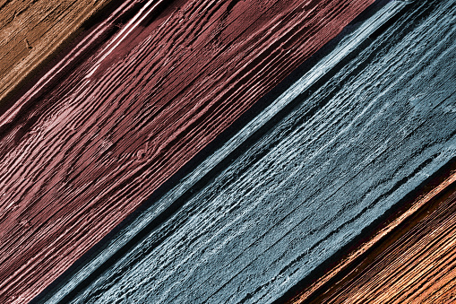 Planks of a floor with different colors, close up