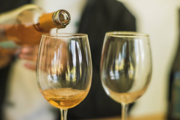 istock Waiter serving wine in crystal glasses during a tasting 1817000868