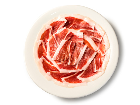 Salami slices on white background. Horizontal photo.