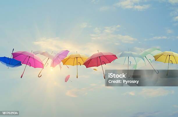 Umbrellas Lineup Across The Sky Stock Photo - Download Image Now - Umbrella, Insurance, Rain