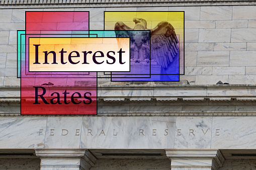 Interest  Rates Monetary percentage concept. hand holding icon debt rate or increase interest percent. debt increase, interest rate rise, interest burden, loan problem, federal Reserve or central bank raising policy