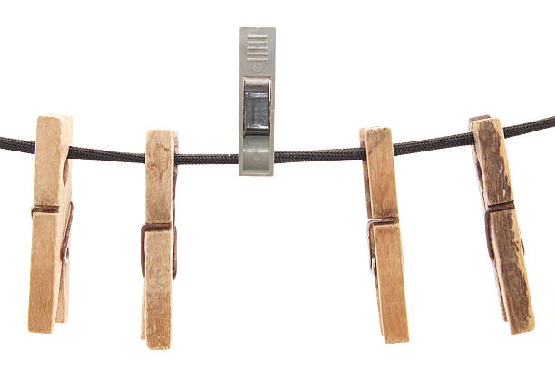 istock Clothespins and rope on a white background 181704810