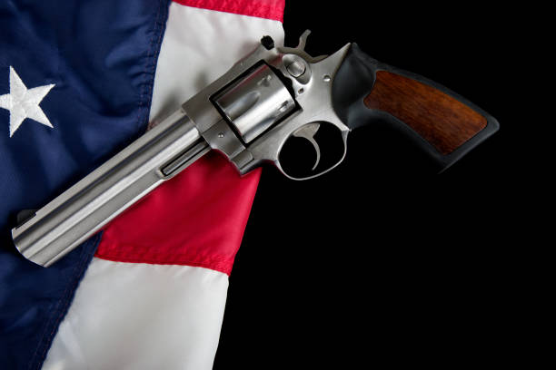 istock 357 Magnum revolver lay on American Flag background 1817050060