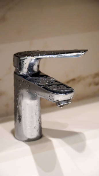 istock Modern sink, faucet and water drops 1817052761