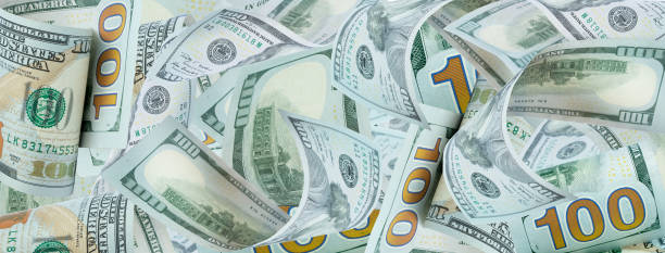 istock Background of 100 dollar bills. Top view. Banner. 1817066084