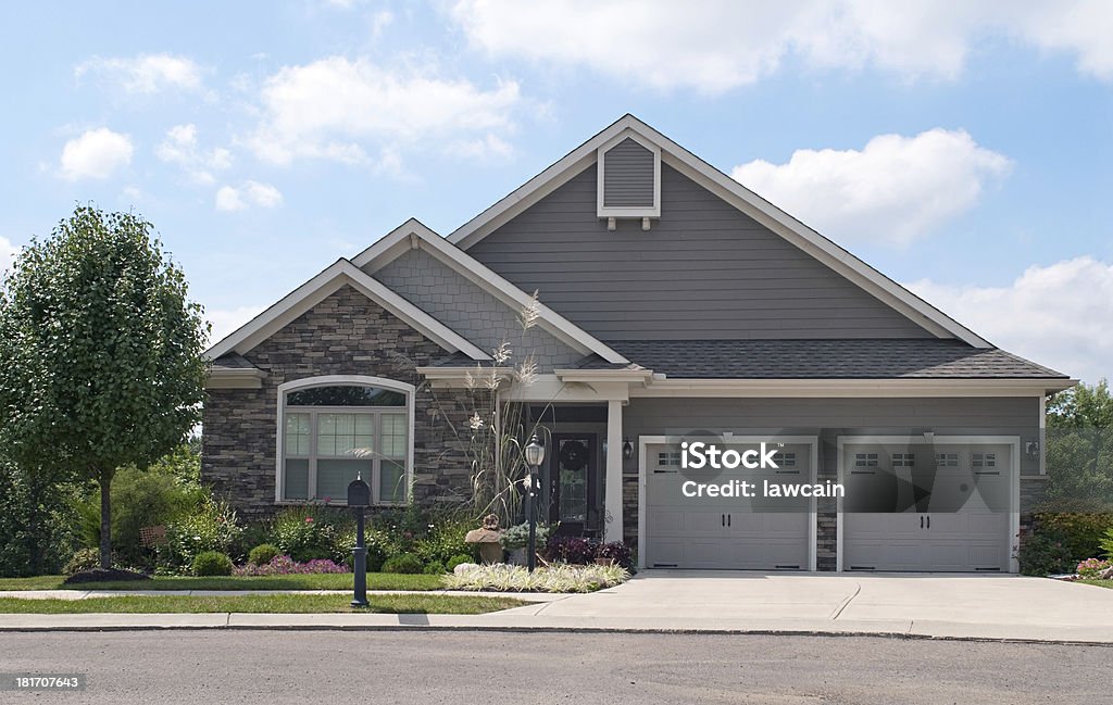 Small House with Two Car Garage Small suburban house with two-car garage. House Stock Photo