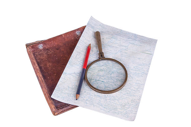 istock old-style home-made map with magnifier, pencil and leather case 181708487