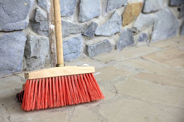istock large broom on wall outdoor - housework 181711261
