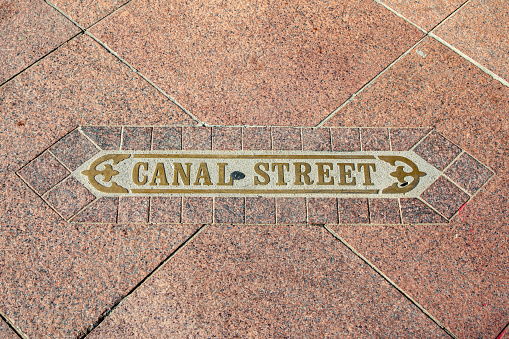 copper inlet canal street at sidewalk downtown New Orleans, Louisiana, USA
