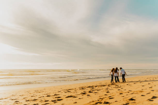 istock Child friends talking on the beach 1817130512