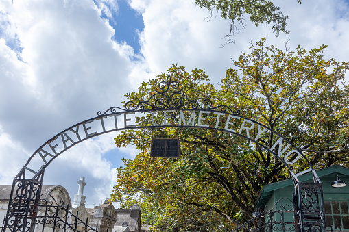 historic iron entrance gate of La Fayette cemetery in New Orleans, Louisiana, USA