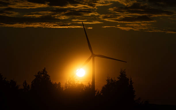 istock Wind turbine on the sunset. Blue energy. 1817141751
