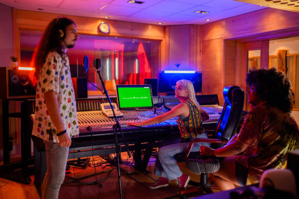 istock A singer recording in a music studio. 1817142319