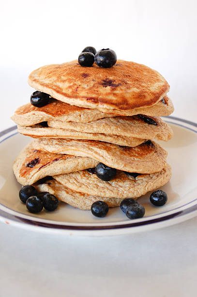 mirtillo avena pancake stack - oat oatmeal isolated stack foto e immagini stock