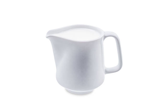 White Jar of milk on a white isolated background. toning