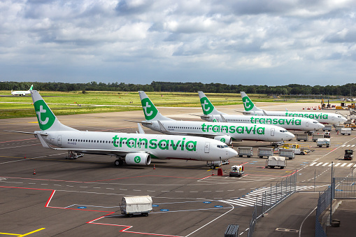 Transavia low-cost airline passenger planes on the tarmac of Eindhoven Airport. The Netherlands - June 30, 2020