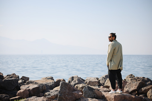 Man Looking At Beautiful Beach View