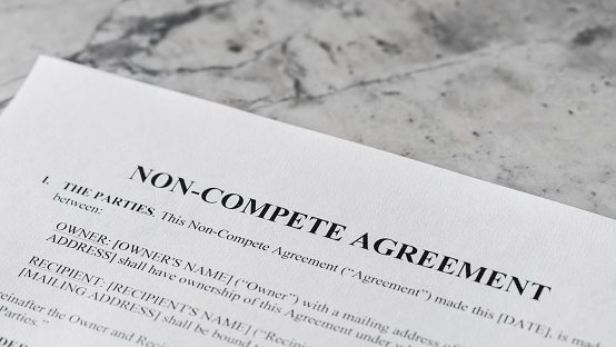 Close up of a non-compete clause agreement.