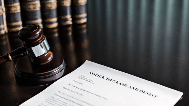 istock Cease and Desist Letter with Gavel and Books 1817181108