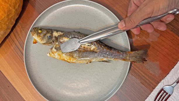 istock Baked sea bass served on a plate. 1817184259