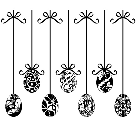 Collection of different hanging Easter egg decorations isolated on white