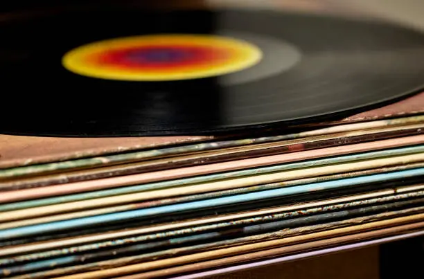 Close up of a stack of vintage 33 RPM Vinyl Record Album Jackets
