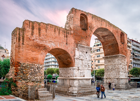 Thessaloniki, Greece - November 26 2023: The Arch of Galerius aka Kamara, on Egnatia St, in the center of the city. A Roman 4th century monument built a triple arch, however only the two thirds remain now.