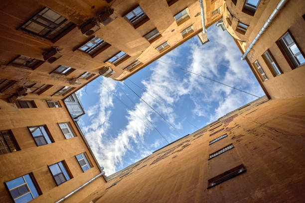 istock Bottom up view of old square courtyard well 1817251420