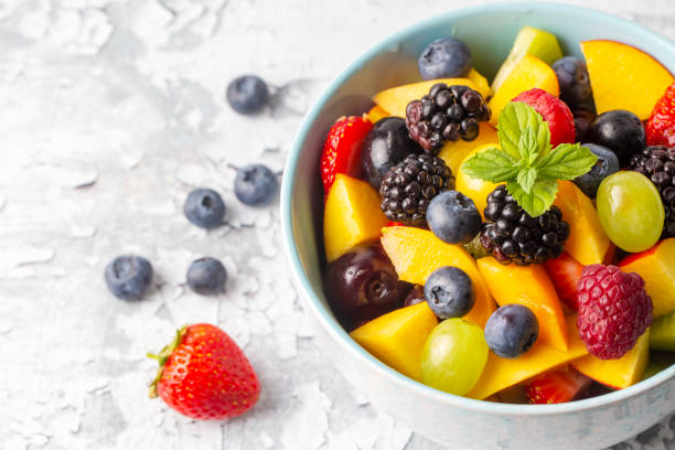 istock Dietary fruit salad with fresh summer fruits 1817256824