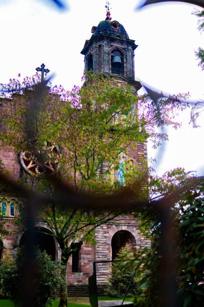 istock Abstract fence frames Elizondo church; autumn cloudscape. 1817265904