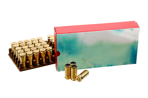 Cartridges with rubber bullets. Ammunition for a traumatic pistol. Non-lethal weapons. Isolate on a white background.