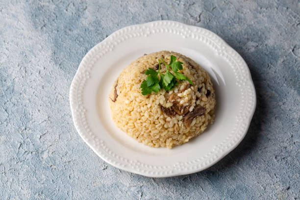 istock Turkish foods; Bulgur pilaf with mushrooms (Turkish name; mantarli bulgur pilavi) 1817282051