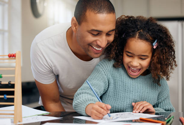 istock Child, father and drawing creative in home for education, school project or knowledge development. Female person, man and dad parent connection support art homework or craft hobby, learning on paper 1817282629