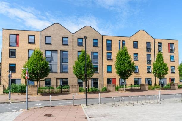 istock New apartment building in a housing development on a sunny day 1817287671
