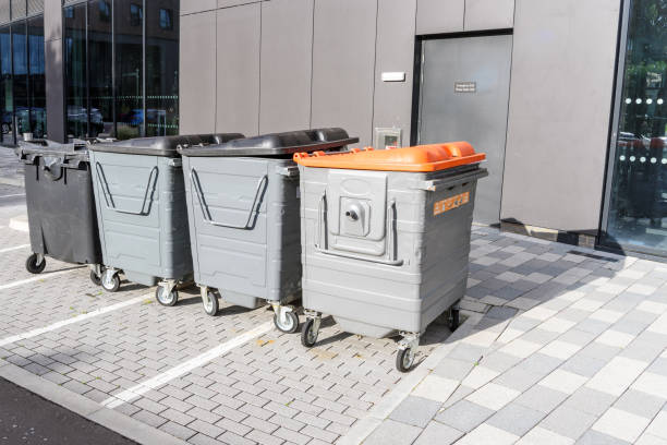 Recycling and waste bins outside a office building