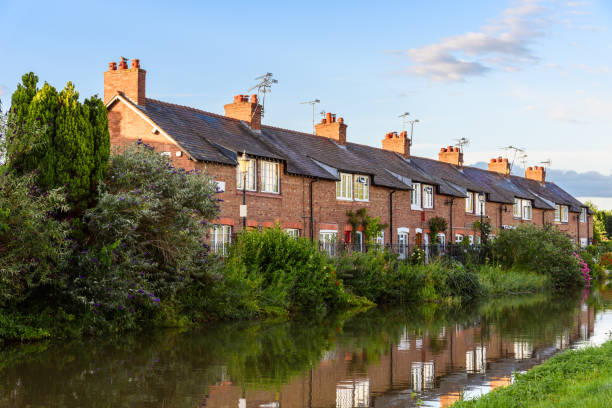 istock Old brick terraced houses along a canal 1817288978