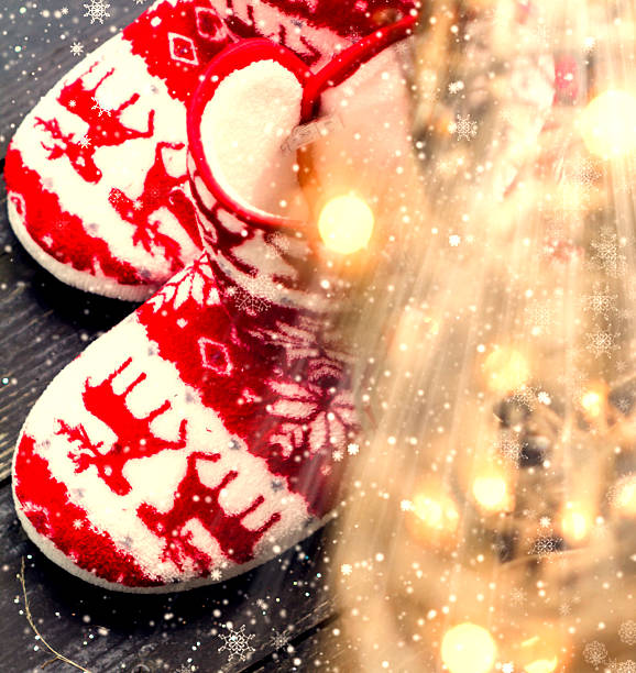 istock Christmas composition with lights  and home uggi, 181730067