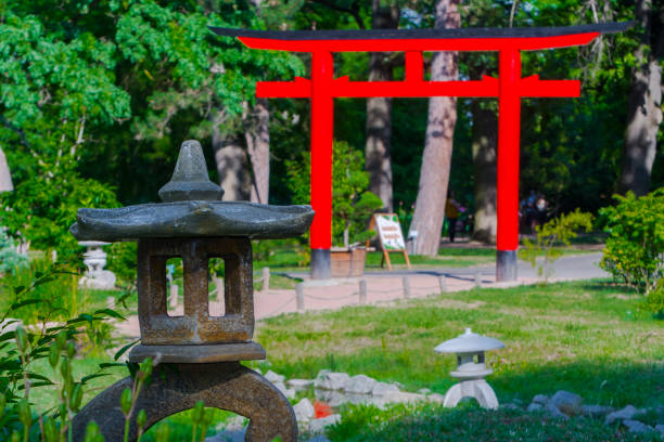 istock Japanese garden with a red gate in summer 1817302087