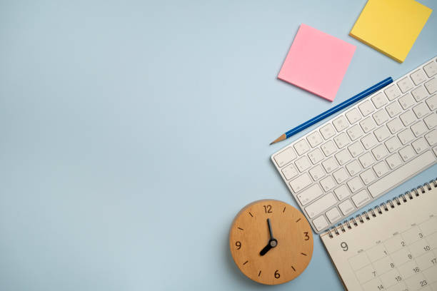 istock close up of workspace desk with notebook, laptop or computer keyboard with copy space blue table background, minimal style, for creative flat lay concept 1817343331