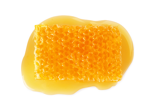Natural honeycomb with tasty honey isolated on white, top view